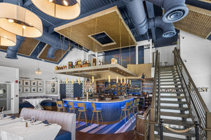 Elevating Hospitality Design: How Acoustic Ceiling Tiles Enhance Guest Comfort Without Sacrificing Style