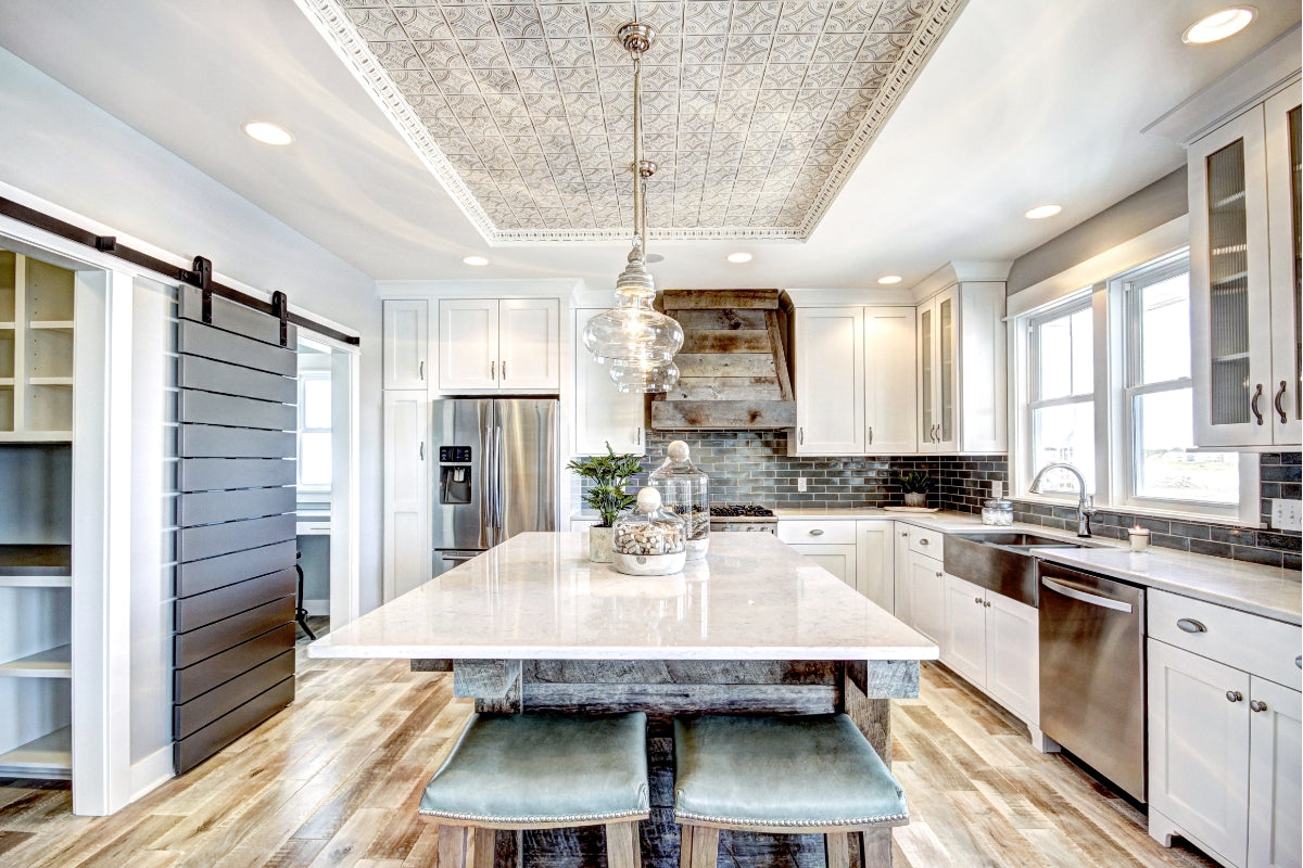 https://www.americantinceilings.com/cdn/shop/articles/ATC-Next_Level_Kitchens-ceiling_designs_for_the_kitchen-hero.jpg?v=1679663790&width=1200